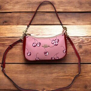 Coach Pink Crossbody Bag with Cherry Design
